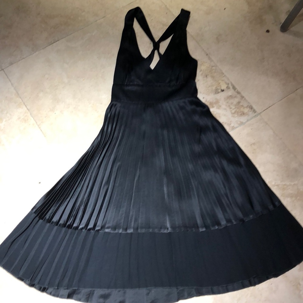 Bebe pleated open back black cocktail dress